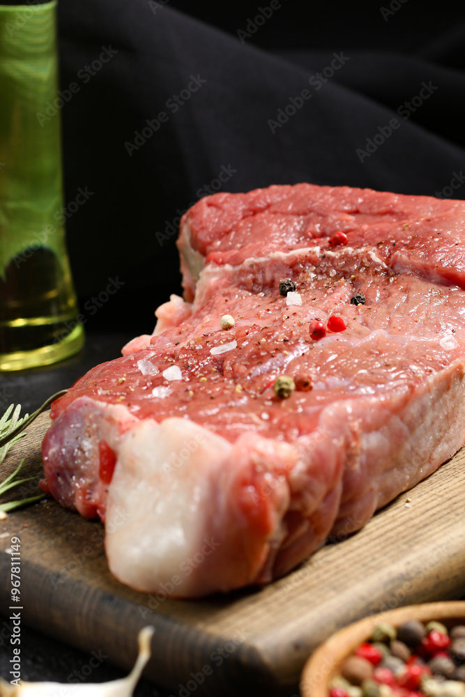Fototapeta premium Meat closeup with pepper and salt