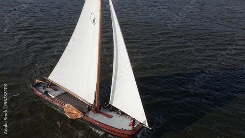 Aerial view of sailboats competing on the beautiful Sneekermeer lake in summer, Sneek, Netherlands. photo