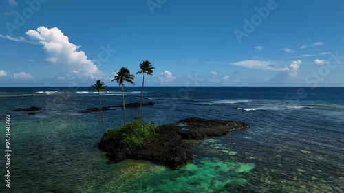 Aerial view of tropical island with palm trees and clear water reef, Atua, Samoa. photo