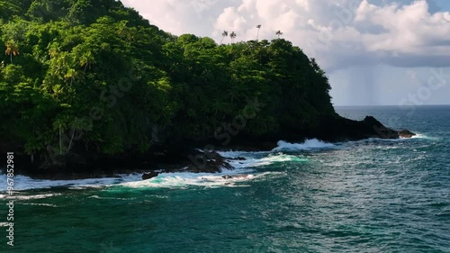 Aerial view of tropical island with pristine beaches and lush greenery, Atua, Samoa. photo