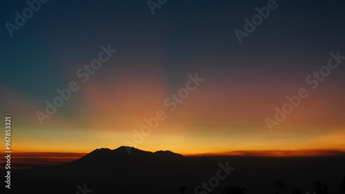 silhouette of mountains on the horizon