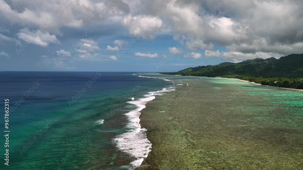Aerial view of beautiful tropical island with coral reef and sandy beach, Rarotonga, Cook Islands.