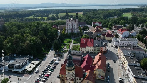 Aerial drone view of castle  and Church in Otmochow a town in Nysa County, Opole Voivodeship, Poland. Otmuchow town in summer. Otmuchow panorama from drone aerial fly. photo