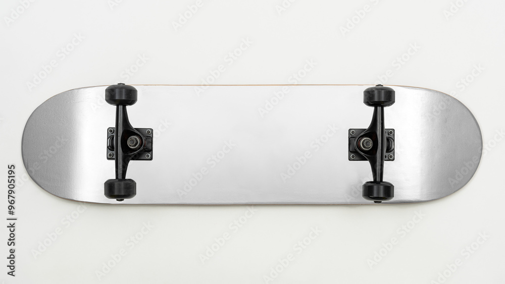 Silver skateboard with black wheels design element Silver skateboard with black wheels design element