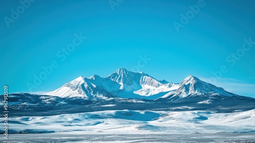 Wallpaper Mural A majestic snow-capped mountain range under a clear blue sky. Torontodigital.ca
