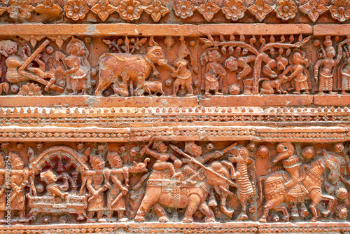 Obraz na płótnie terracotta details carved on the ancient Govinda Temple at Puthia Religious Complex, Rajshahi, Bangladesh. w salonie
