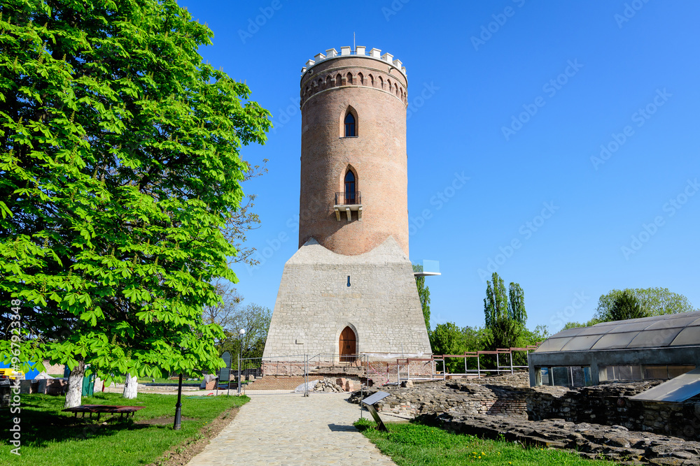 custom made wallpaper toronto digitalThe Chindia Tower or Turnul Chindiei, old buildings and ruins at Targoviste Royal Court (Curtea Domneasca) in Chindia Park (Parcul Chindia) in the historical part of the city in a sunny spring day