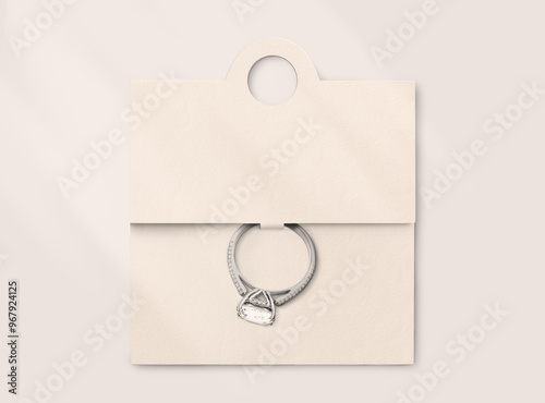 white jewelry card, with ring