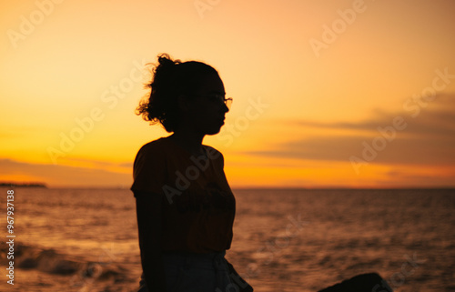 woman silhouette at sunset