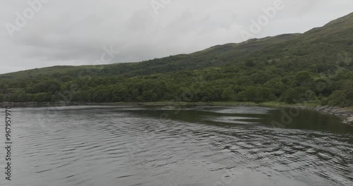 Aerial view of tranquil Loch Creran surrounded by lush forest and serene mountains, Oban, Scotland. photo