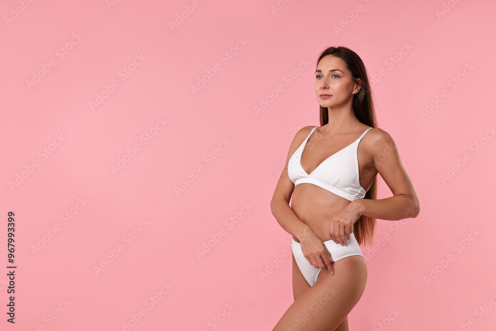 Beautiful woman with perfect skin on pink background, space for text. Body care Beautiful woman with perfect skin on pink background, space for text. Body care