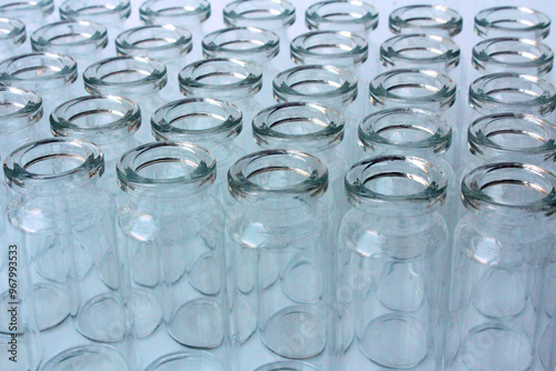 New glass vials for instrumental analysis on a white background. analytical vials prepared for chemical analysis photo