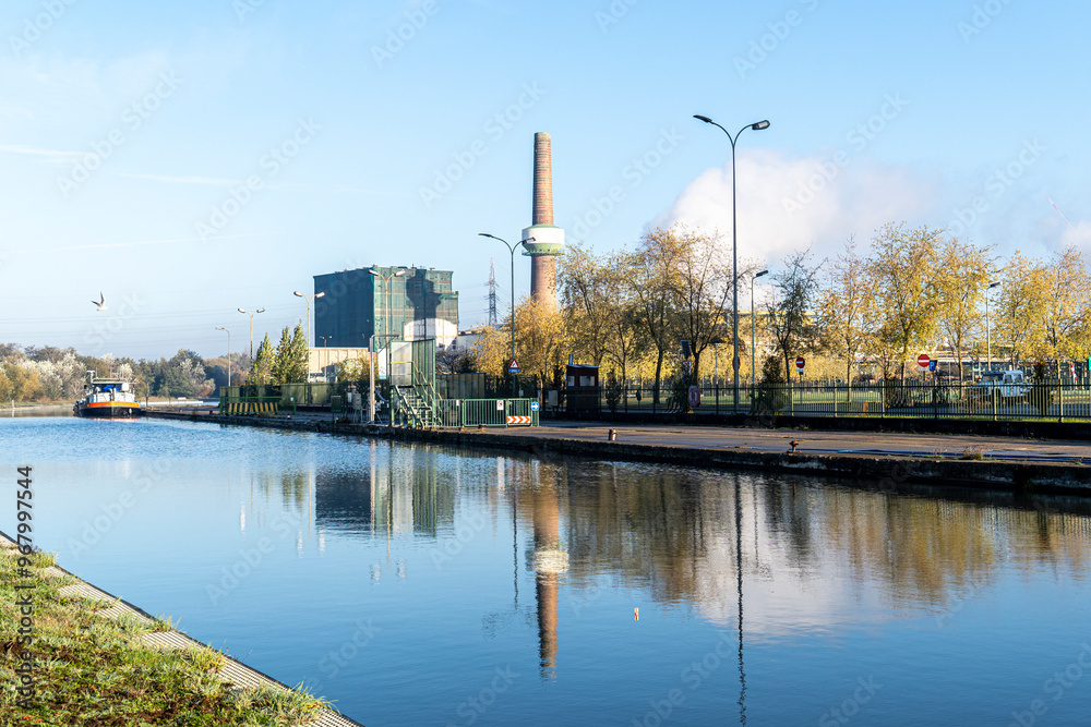 Fototapeta premium Industrial Landscape with Factories and Machinery