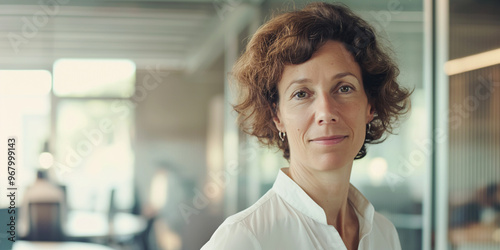 Professional mature business woman in office interior