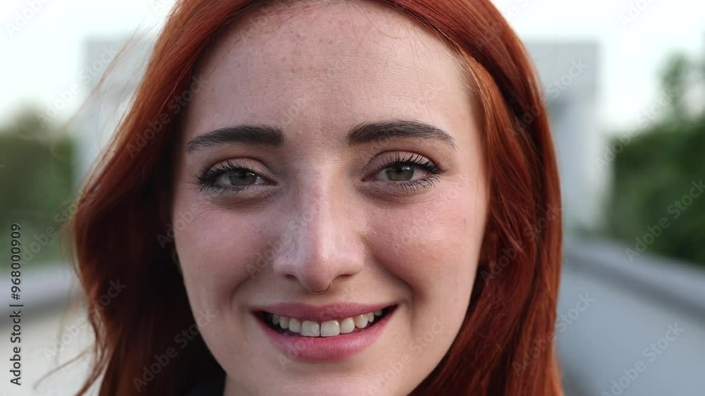 Close-up shot of a young woman's face, highlighting her green eyes and natural red hair in soft lighting. Close-Up of Woman's Eyes with Red Hair Close-up shot of a young woman's face, highlighting her green eyes and natural red hair in soft lighting. Close-Up of Woman's Eyes with Red Hair