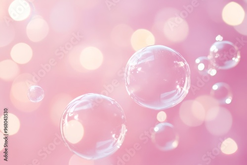 milky soap bubbles on pastel pink background with bokeh, hygiene topic backdrop with copy space, products for babies and child birth