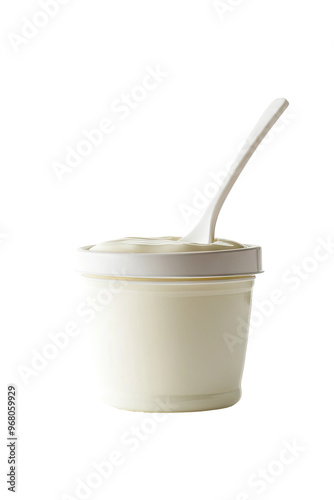 A single-serving container of yogurt with a plastic spoon.