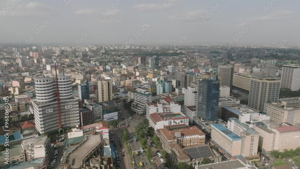 Aerial view of bustling downtown skyline with modern skyscrapers and busy streets, Nairobi, Kenya. Aerial view of bustling downtown skyline with modern skyscrapers and busy streets, Nairobi, Kenya.
