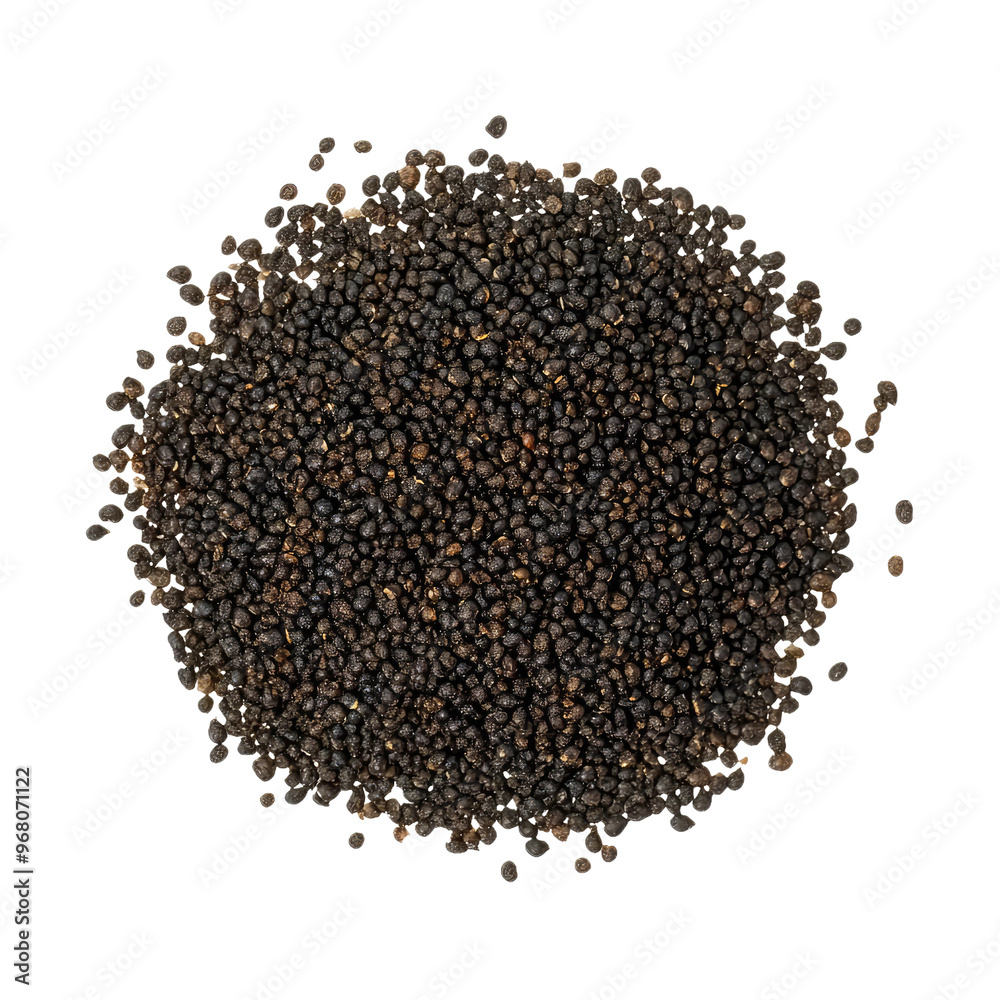 A close-up view of a pile of black peppercorns. A close-up view of a pile of black peppercorns.