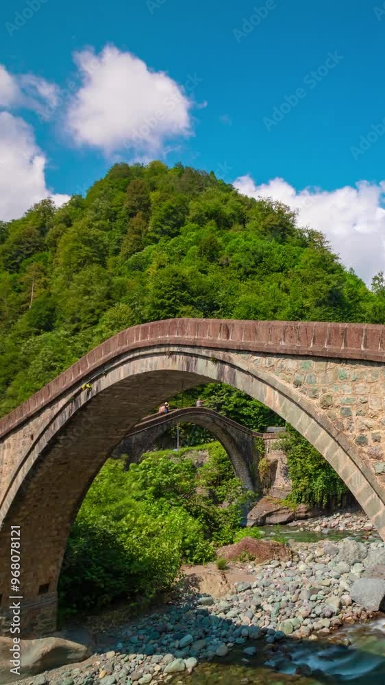 Cifte Bridge or Cifte Kopru of Artvin vertical time lapse video. Visit Turkey concept video. Cifte Bridge or Cifte Kopru of Artvin vertical time lapse video. Visit Turkey concept video.