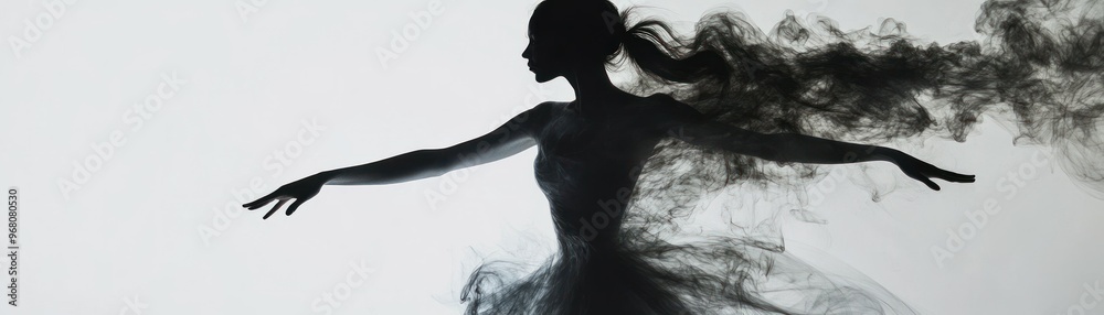 Fototapeta premium Silhouette of a Woman Reaching Out With Smoke Swirling Around Her