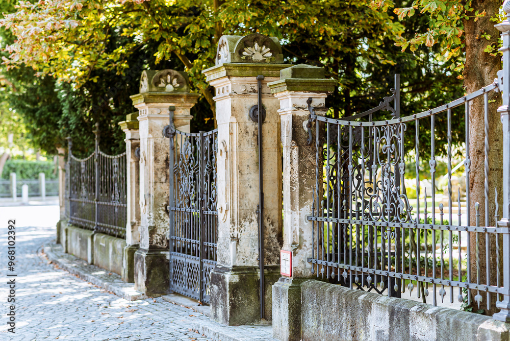 Old wrought iron fence in the city park