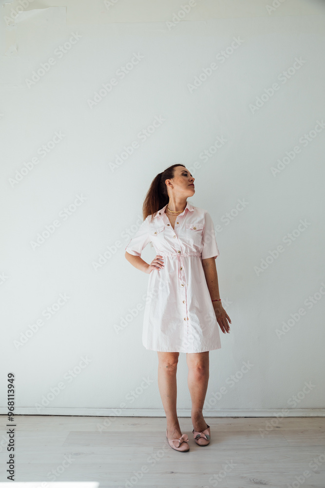 Beautiful woman 40 years old in dress posing Beautiful woman 40 years old in dress posing