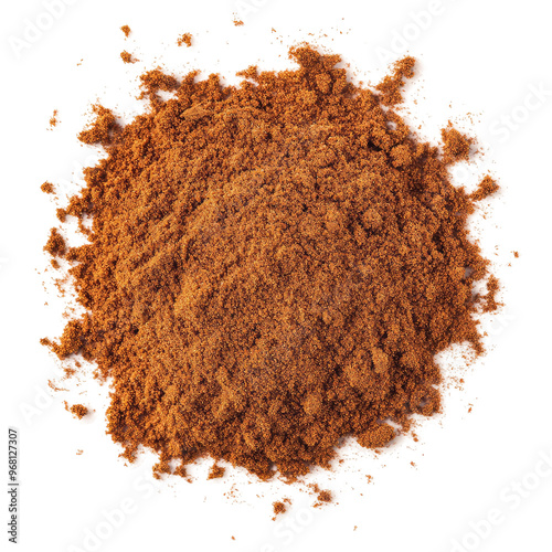 A close-up shot of a pile of cinnamon powder, the warm brown color inviting you to use it in your baking.