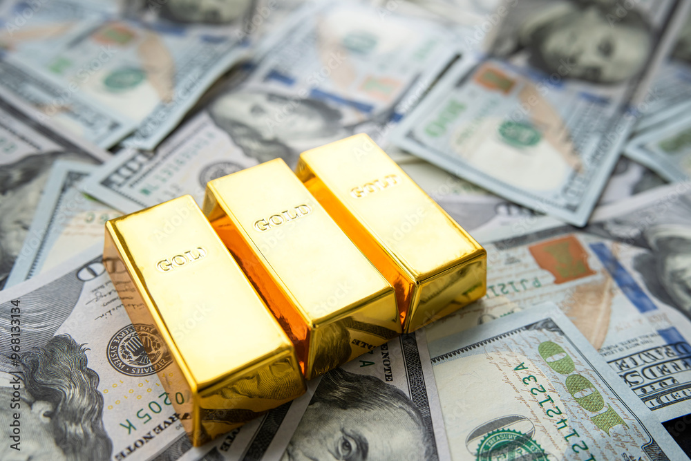 american dollar banknote and gold bullions, wealth and saving concept american dollar banknote and gold bullions, wealth and saving concept