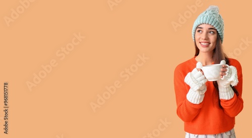 Stylish young woman in warm...