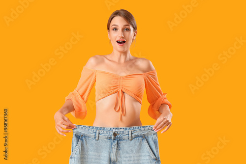 Shocked beautiful young wom...