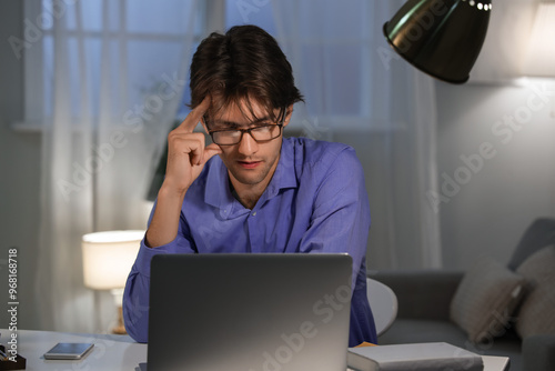 Young businessman working w...