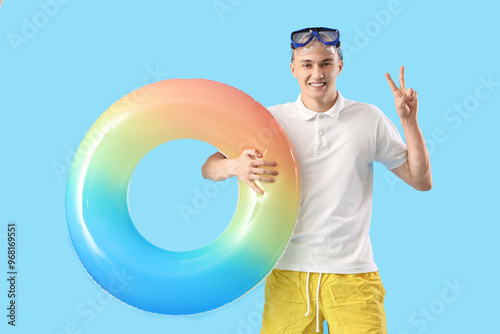 Young man with snorkeling m...