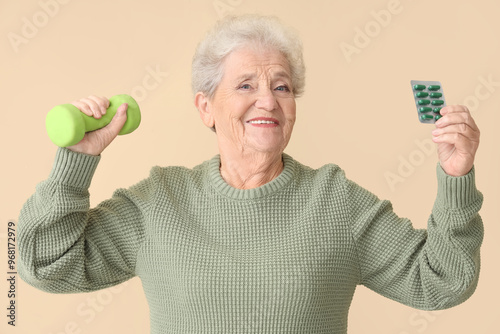 Senior woman with pills and...
