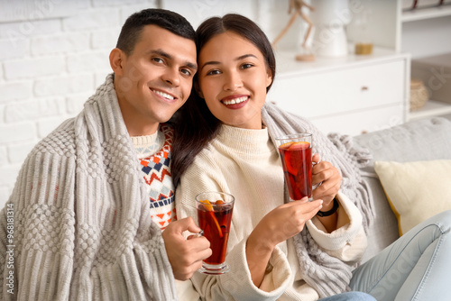 Happy couple with glasses o...