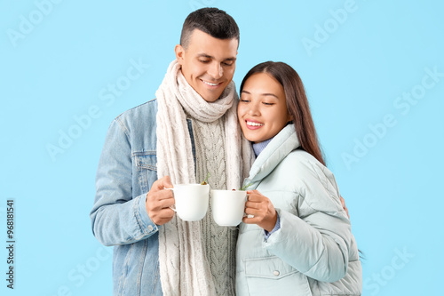 Happy couple in warm clothe...