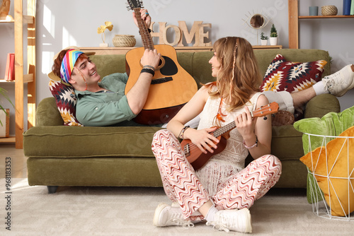 Couple of hippies playing g...