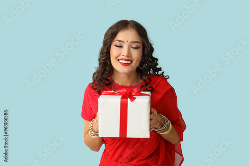 Happy young indian woman in...