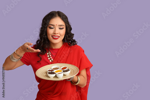 Smiling indian woman in red...