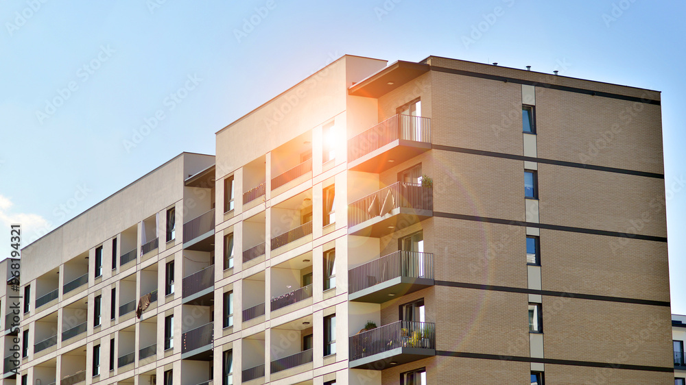 Fototapeta premium Modern architecture of urban residential apartment building. Apartment building exterior, residential house facade.