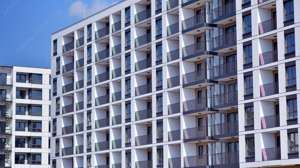Fototapeta premium Modern architecture of urban residential apartment building. Apartment building exterior, residential house facade.