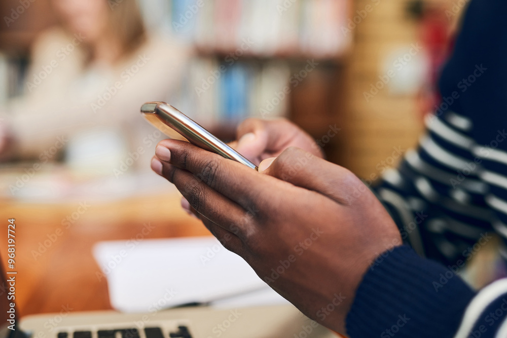 Phone, library and hands of man with laptop at university for education, communication or online chat. Computer, smartphone and college student on mobile app for study schedule, research or project Phone, library and hands of man with laptop at university for education, communication or online chat. Computer, smartphone and college student on mobile app for study schedule, research or project