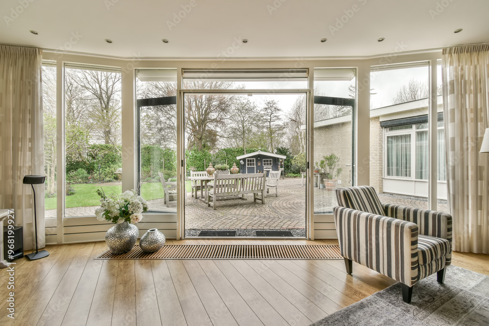 Elegant living room interior with garden view Elegant living room interior with garden view