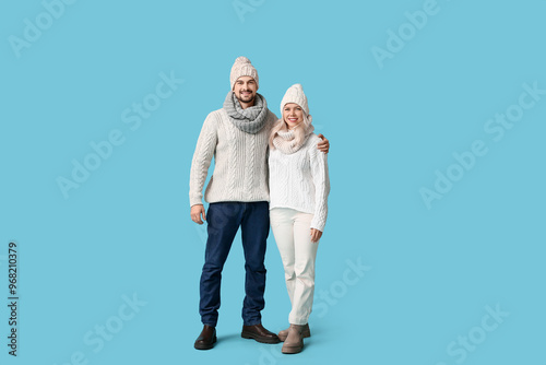 Happy couple in winter clot...