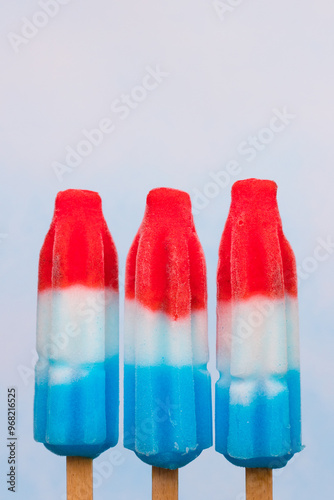фотографія trio of red, white and blue popsicles
