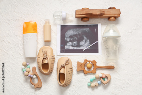 Composition with baby shoes...