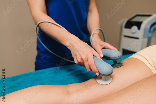 Bild auf Leinwand Tecar therapy for legs
