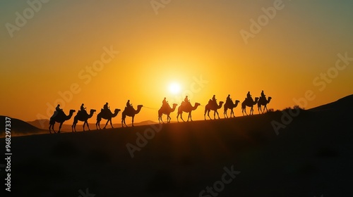 A caravan of camels silhouetted against the setting sun, making their way across the desert dunes.