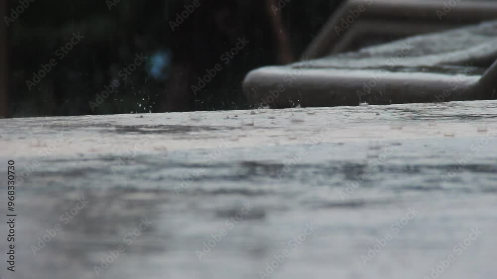 Water rain drops falling over concrete Water rain drops falling over concrete