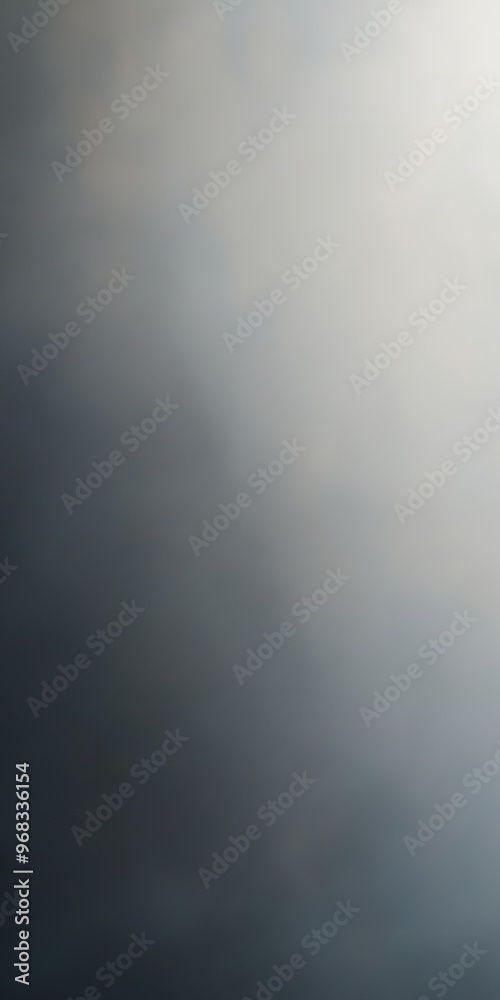 A serene abstract background featuring soft gradients of gray and white tones, perfect for various design projects.